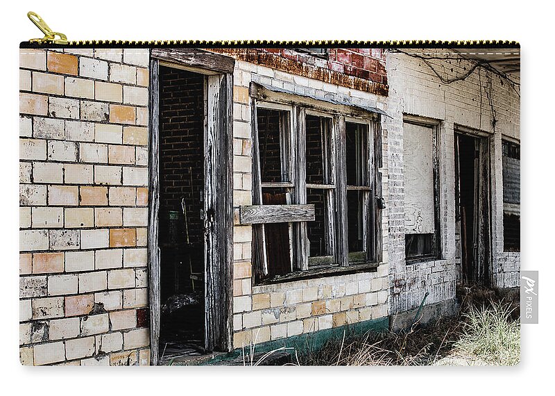 Photo Zip Pouch featuring the photograph Forgotten store by Jason Hughes