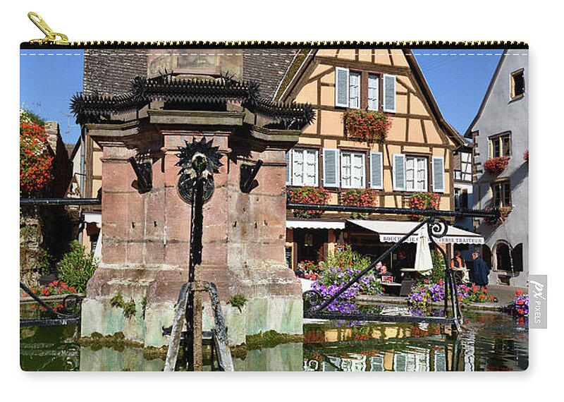 Eguisheim Zip Pouch featuring the photograph Fountain Saint-Leon in Eguisheim, Alsace by RicardMN Photography