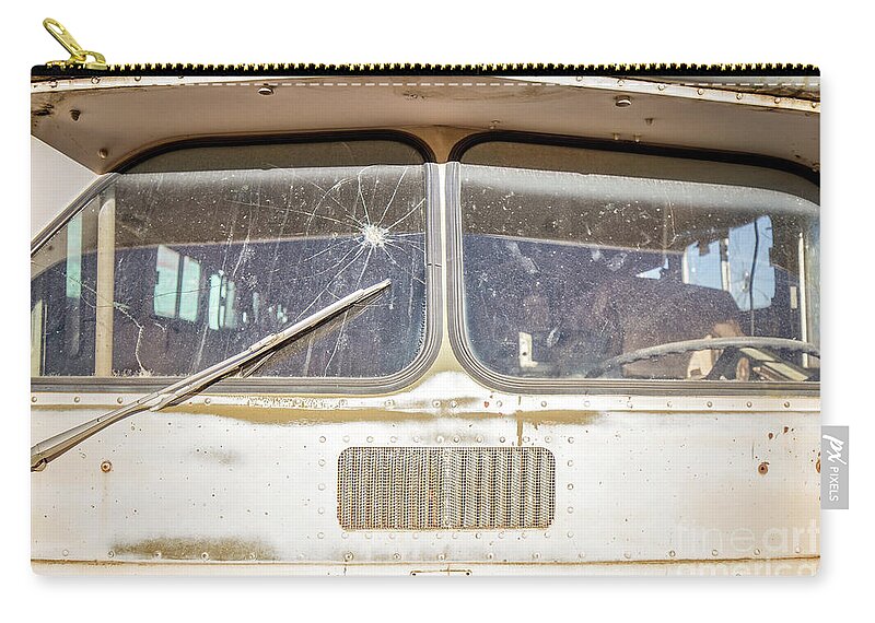 Junkyard Zip Pouch featuring the photograph Front of an old Bus in a junkyard by Edward Fielding