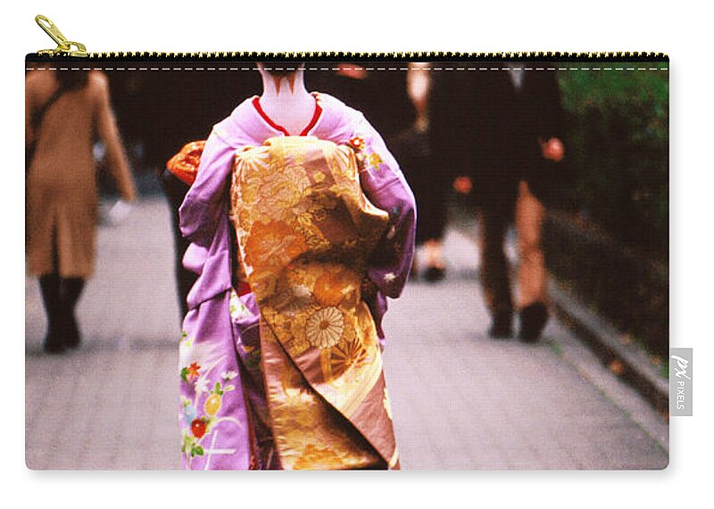 Headwear Carry-all Pouch featuring the photograph Geisha In Kimono Walking Away, Pontocho by Lonely Planet