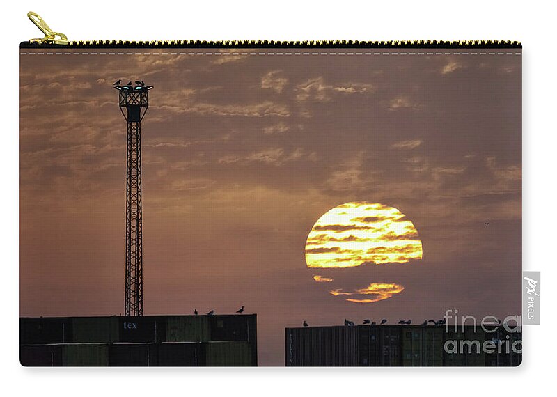 Bright Zip Pouch featuring the photograph Giant Sun at Sunrise Cadiz Harbour by Pablo Avanzini