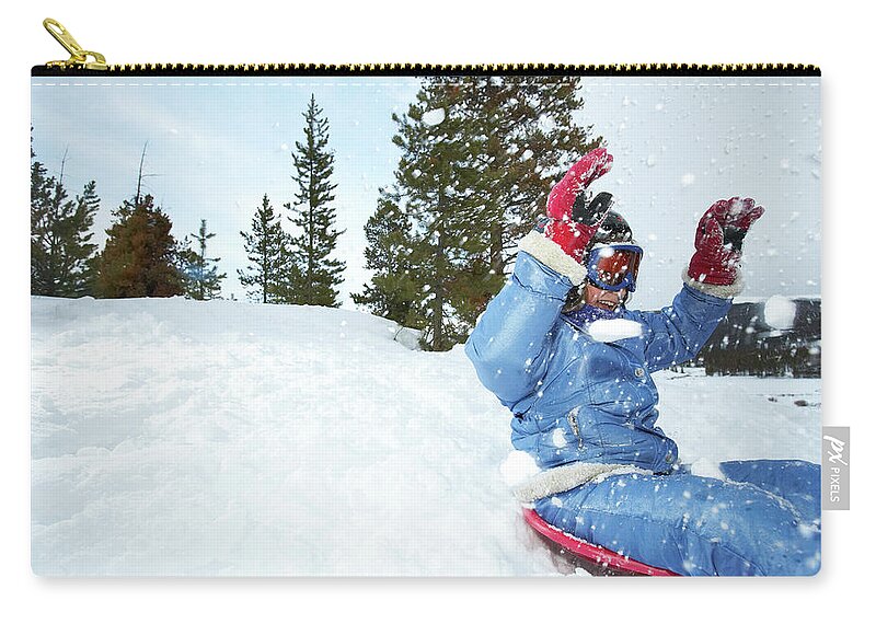 Human Arm Zip Pouch featuring the photograph Girl 8-9 On Sled by Thomas Northcut