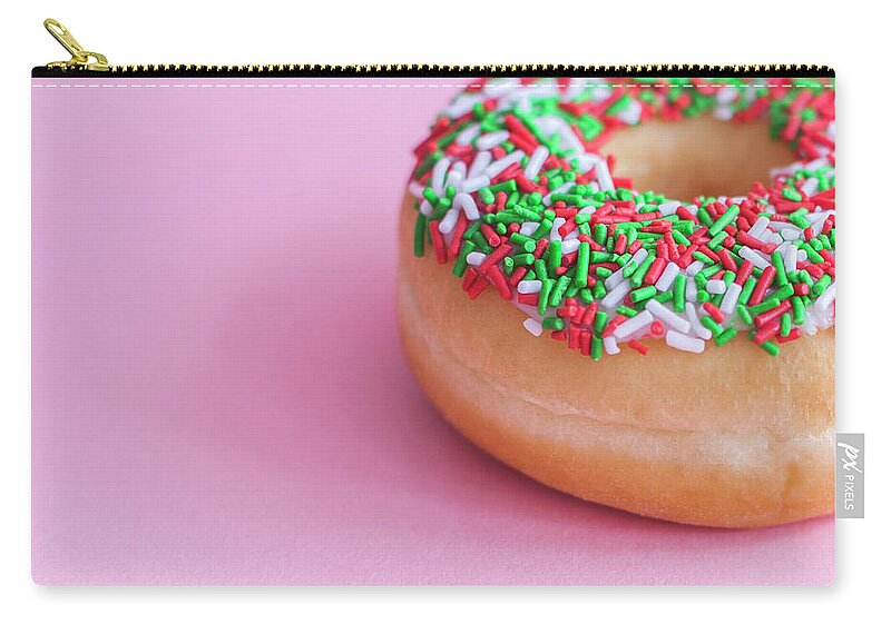 Unhealthy Eating Zip Pouch featuring the photograph Glzed Donut With Sprinkles On A Pink by Steven Errico