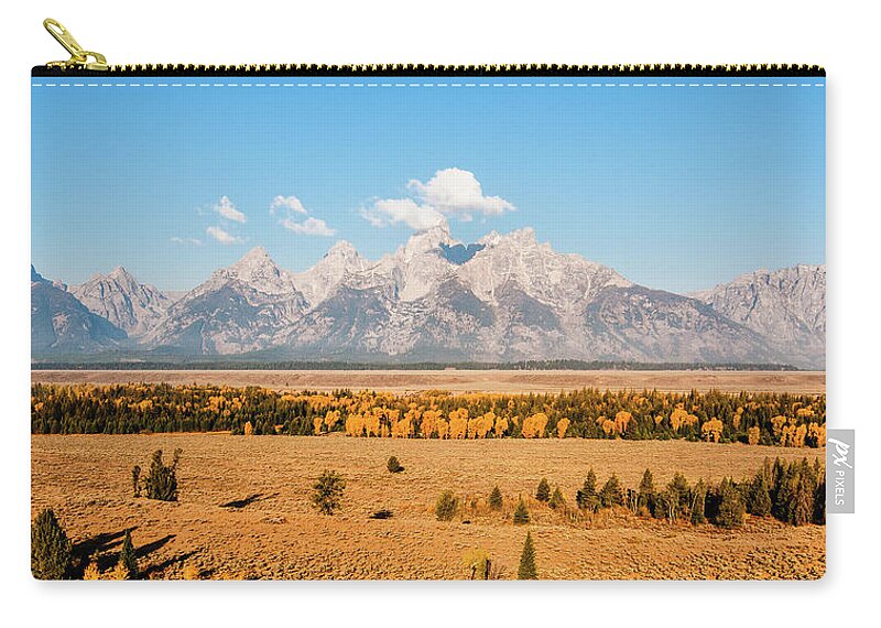 Scenics Zip Pouch featuring the photograph Golden Grand Tetons by Ida C. Shum