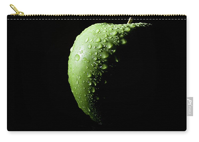 Spot Lit Zip Pouch featuring the photograph Green Apple by By Felix Schmidt