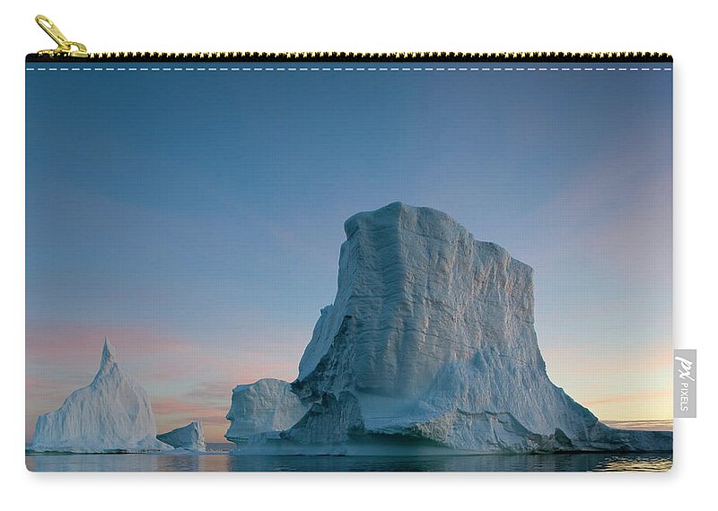 Iceberg Zip Pouch featuring the photograph Greenland, Disko Bay, Massive Icebergs by Paul Souders