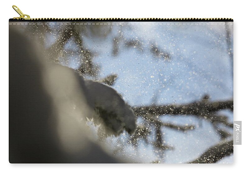 Abstract Zip Pouch featuring the photograph Gusts of snow are being blown from spruce trees by Intensivelight