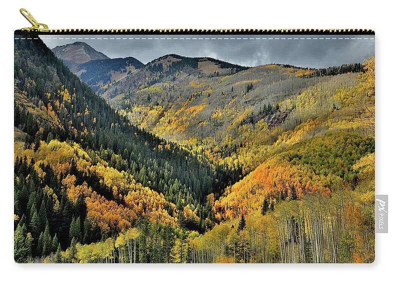 Highway 145 Zip Pouch featuring the photograph Highway 145 Fall Colors in the Spotlight by Ray Mathis