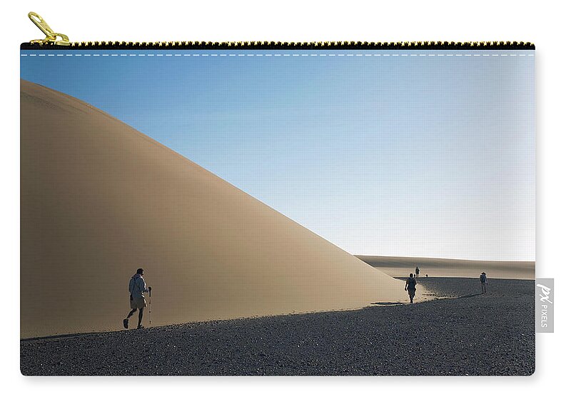 Tranquility Zip Pouch featuring the photograph Hiking In The Namib Desert by Per-anders Pettersson