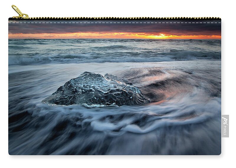 Glacier Lagoon Zip Pouch featuring the photograph Iceberg Sunrise by Antonyspencer