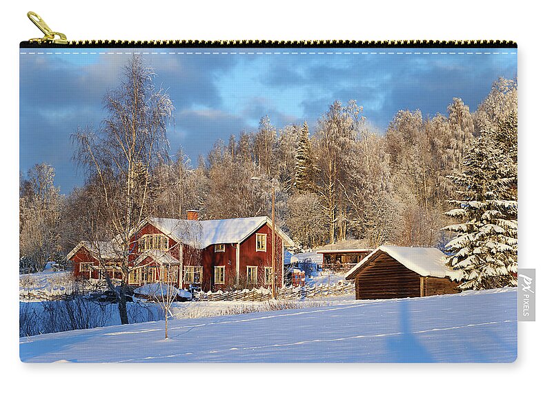 Snow Zip Pouch featuring the photograph Idyllic Red Swedish House Against A by Jonaseriksson