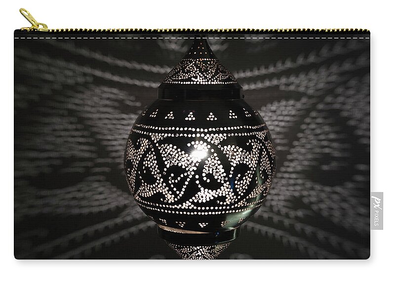 Istanbul Zip Pouch featuring the photograph Illuminated Hanging Light Fixture by Keith Levit / Design Pics