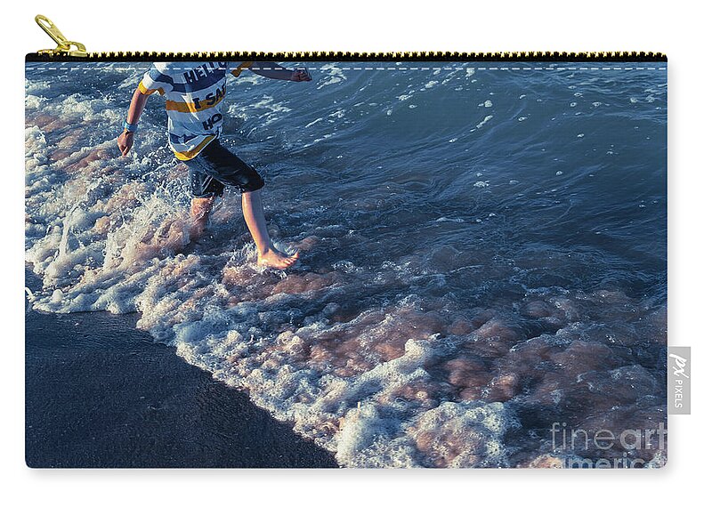 Active Zip Pouch featuring the photograph In summer children have to exercise outdoors and go out to sea t by Joaquin Corbalan