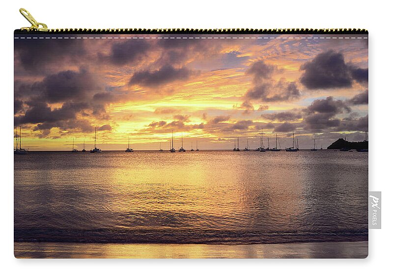 Water's Edge Zip Pouch featuring the photograph Intense Golden Sunset On Serene Sea by Jaminwell