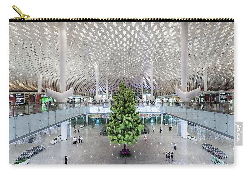 Ceiling Carry-all Pouch featuring the photograph Interior Of The New Shenzen Airport by Martin Puddy