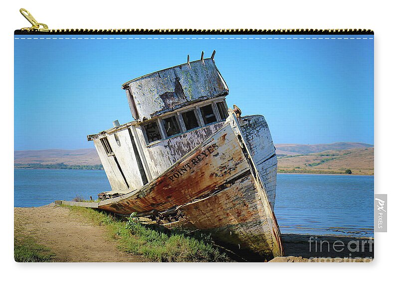 Inverness Shipwreck Zip Pouch featuring the photograph Inverness Shipwreck by Veronica Batterson