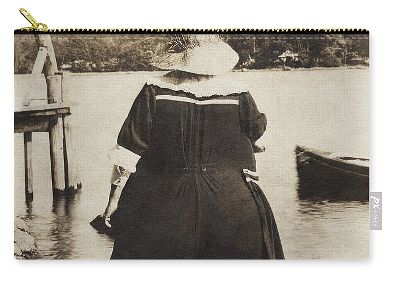 It Zip Pouch featuring the photograph It Floats - version 2 by Mark Miller
