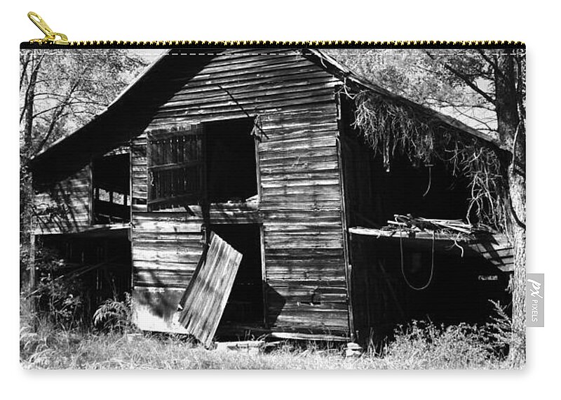 I've Seen Better Days Zip Pouch featuring the photograph I've Seen Better Days Psalm 147 3 Black and White by Lisa Wooten