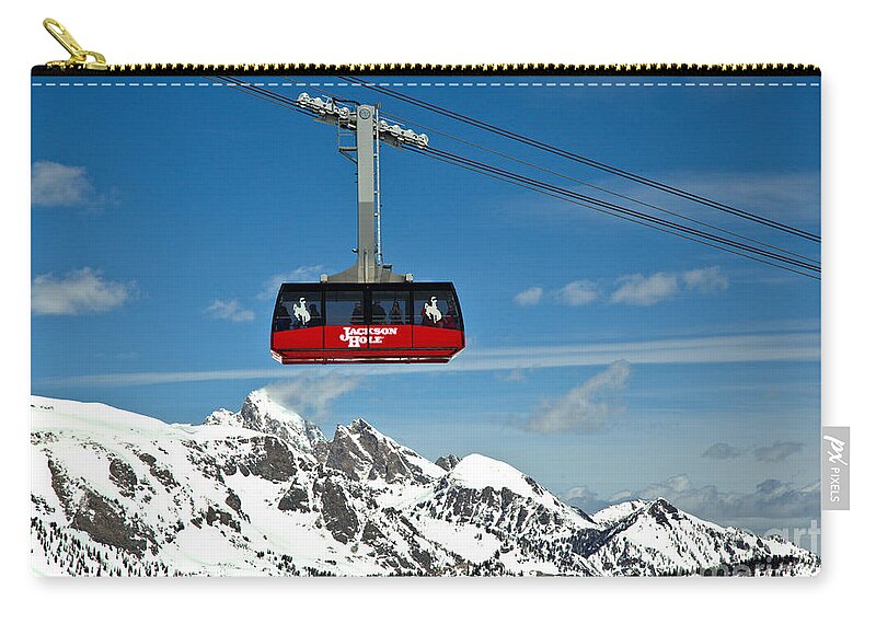 Jackson Hole Tram Zip Pouch featuring the photograph Jackson Hole Tram Over The Snow Caps by Adam Jewell