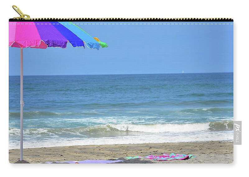 Tranquility Zip Pouch featuring the photograph Just A Dream And The Wind To Carry by Kathleen Covalt