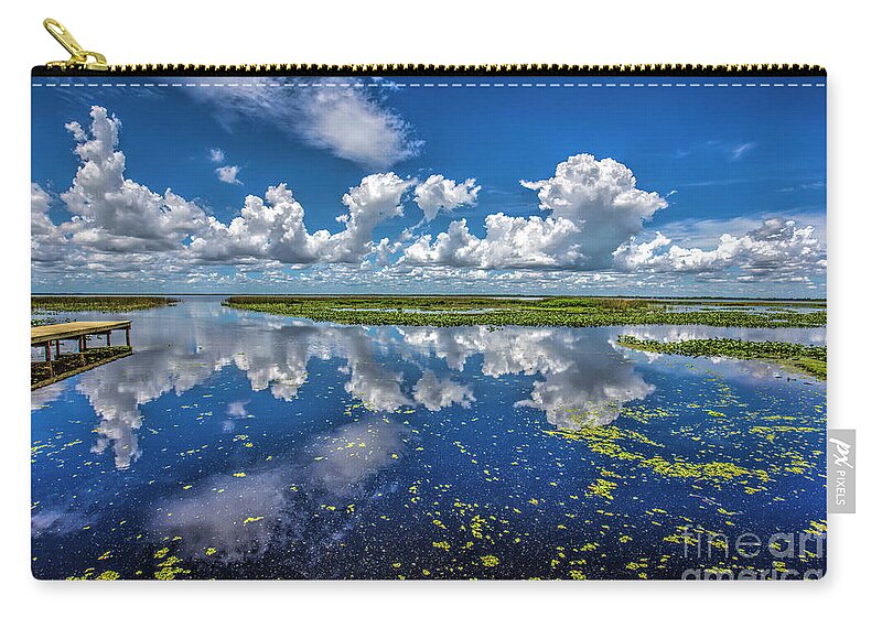 Lake Istokpoga Zip Pouch featuring the photograph Lake Istokpoga, Florida by Felix Lai