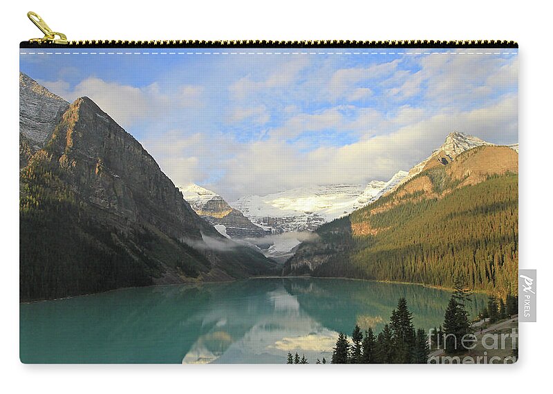 Banff Zip Pouch featuring the photograph Lake Louise at Dawn by Paula Guttilla