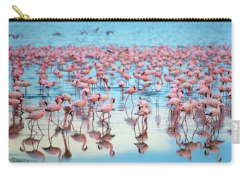 Tranquility Zip Pouch featuring the photograph Lake Nakaru Flamingoes by Grant Faint