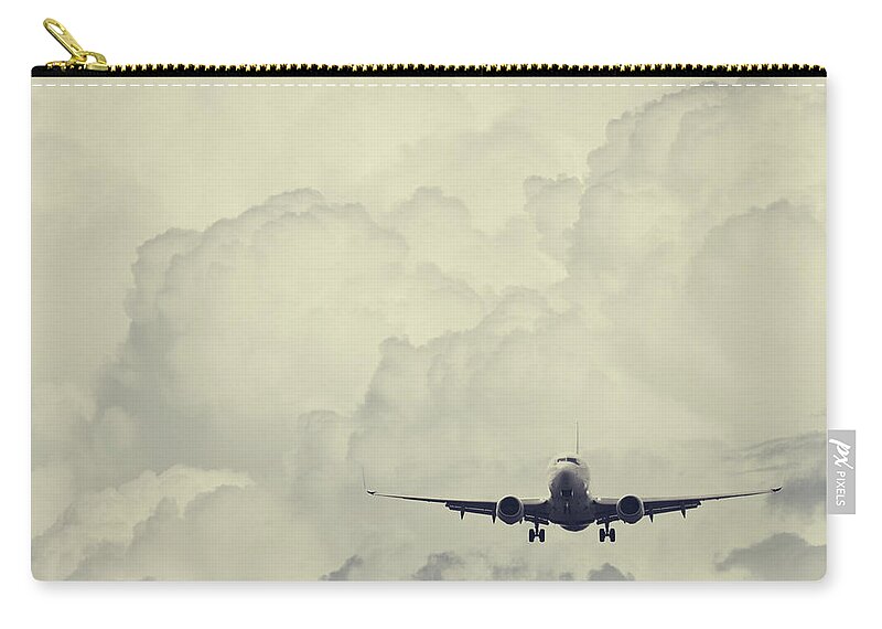 Mid-air Zip Pouch featuring the photograph Landing In Cumulous by Shaunl