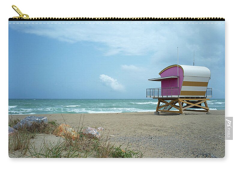 Security Zip Pouch featuring the photograph Lifeguard Station At The Sea by Ra-photos