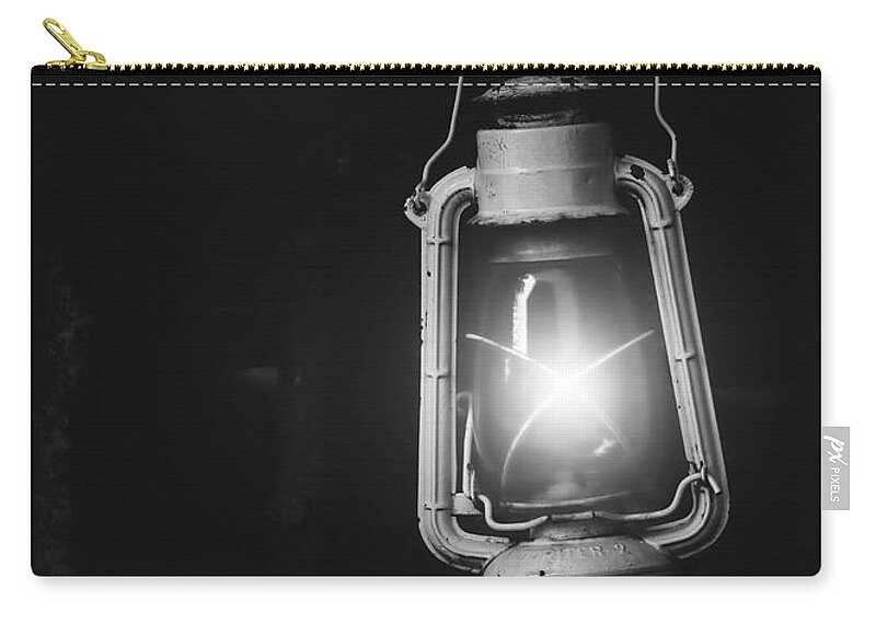 Light Zip Pouch featuring the photograph Light In Darkness by Bob Orsillo