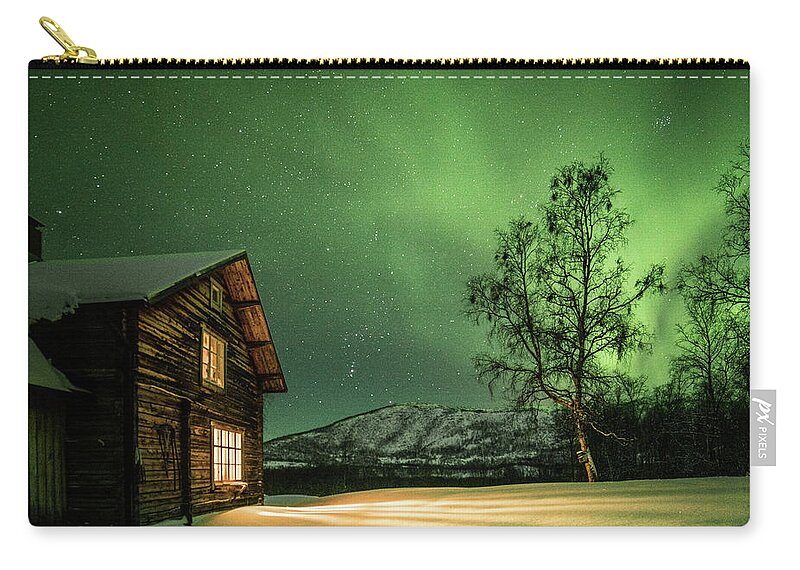 Aurora Zip Pouch featuring the photograph Lights of nature, lights of man by Pekka Sammallahti