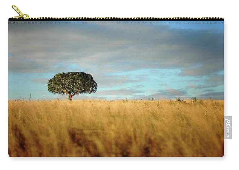 Scenics Zip Pouch featuring the photograph Lonely Tree In Field by Remco Douma