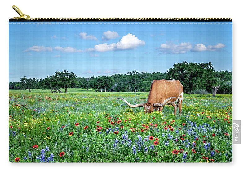 Texas Wildflowers Zip Pouch featuring the photograph Longhorn In Bluebonnets by Johnny Boyd