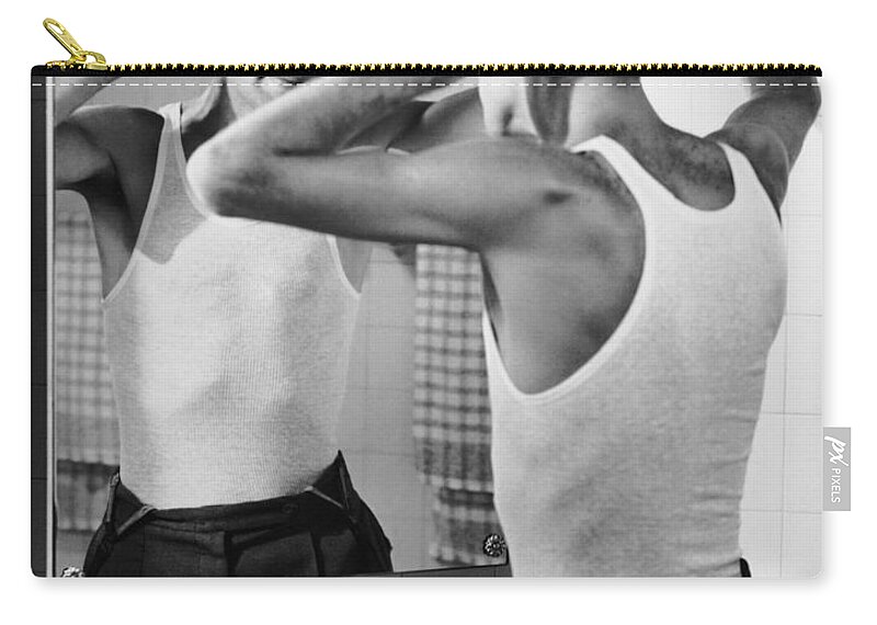 Comb Zip Pouch featuring the photograph Man Combing Hair In Bathroom by George Marks