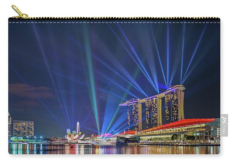 Laser Zip Pouch featuring the photograph Marina Bay Light Show by Coolbiere Photograph