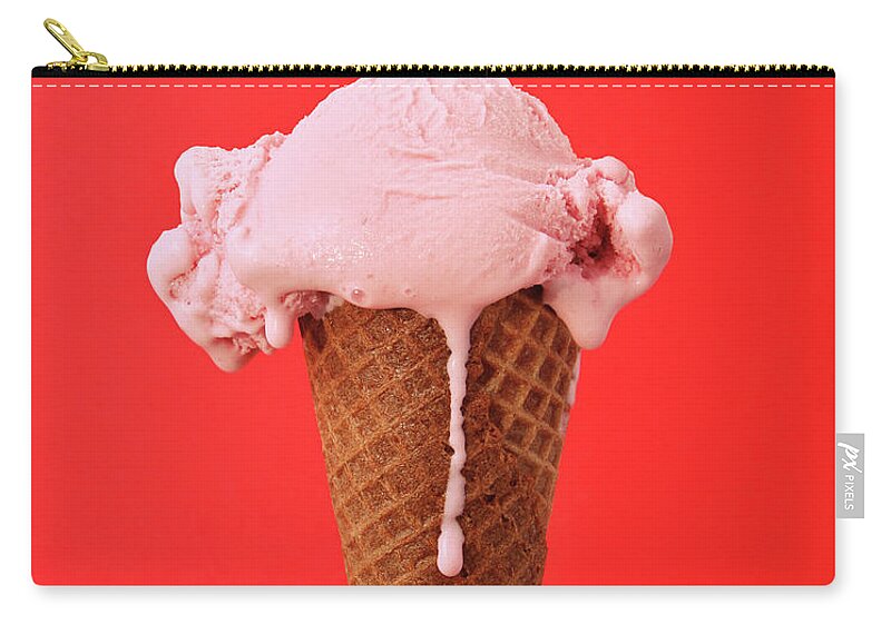 Melting Zip Pouch featuring the photograph Melting Strawberry Ice Cream Cone by Kevinruss
