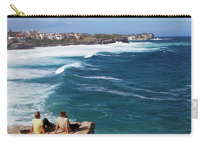 Scenics Zip Pouch featuring the photograph Men On Sea Rocks At Bronte Beach by Oliver Strewe