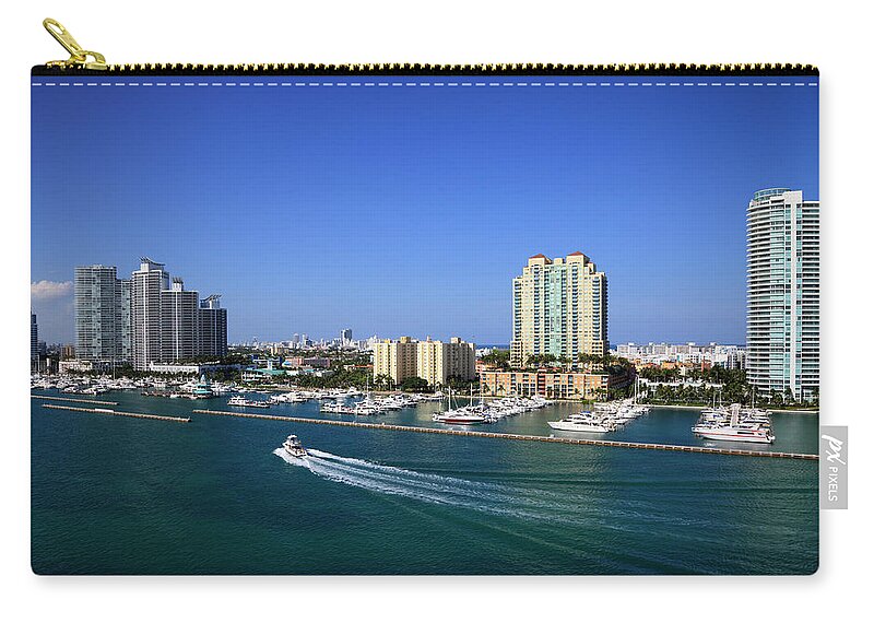 Built Structure Zip Pouch featuring the photograph Miami Beach Marina by Jorgegonzalez