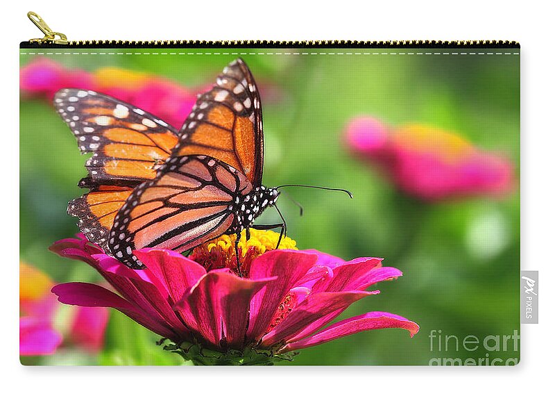 Pink Zip Pouch featuring the photograph Monarch Visiting Zinnia by Angela Rath