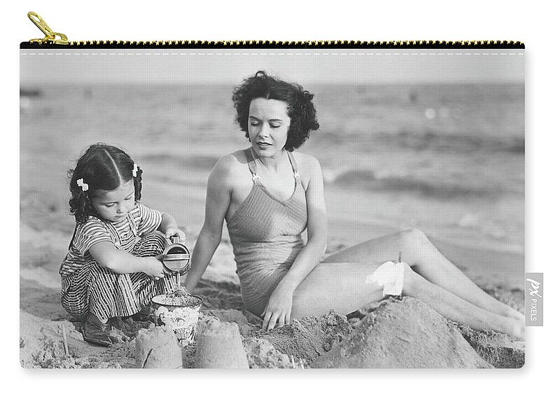 Mid Adult Women Zip Pouch featuring the photograph Mother With Girl 2-3 Playing In Sand On by George Marks