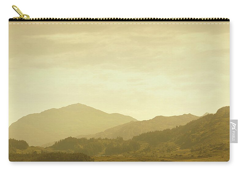 Scenics Zip Pouch featuring the photograph Mountains In Ireland At Early Morning by Mammuth