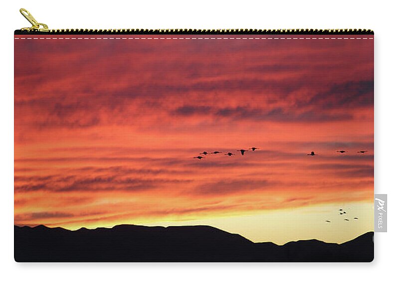 Arizona Zip Pouch featuring the photograph Mule Mountains Sunset by Jean Clark