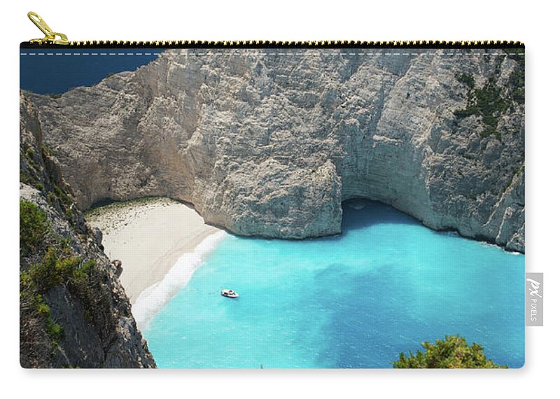 Tranquility Zip Pouch featuring the photograph Navagio Bay From Above, Greece by Photo By George Koultouridis