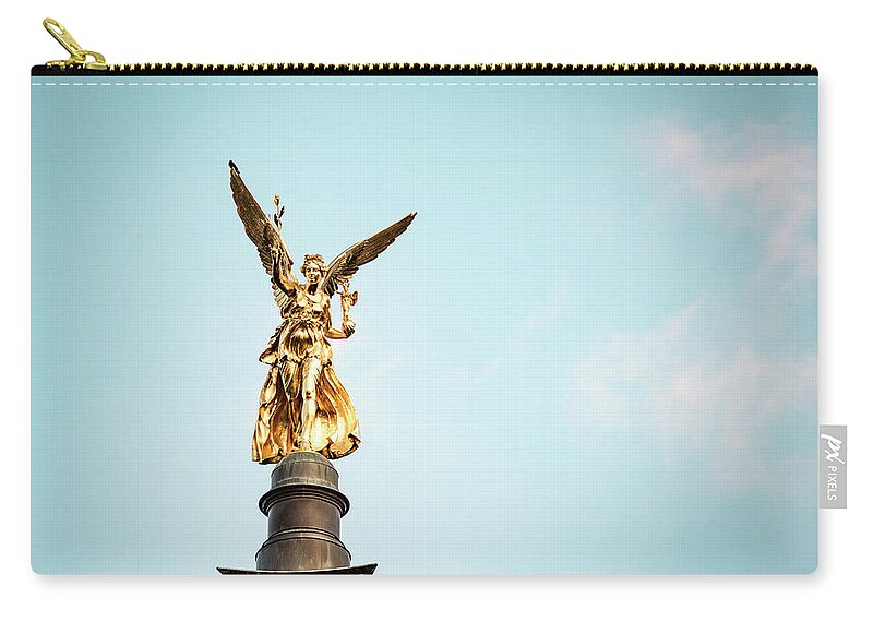 1x1 Carry-all Pouch featuring the photograph Nike - the golden beauty by Hannes Cmarits