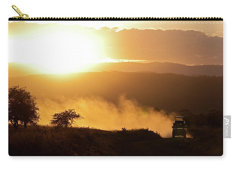 Scenics Zip Pouch featuring the photograph Off Road Vehicle At Sunset by Wldavies