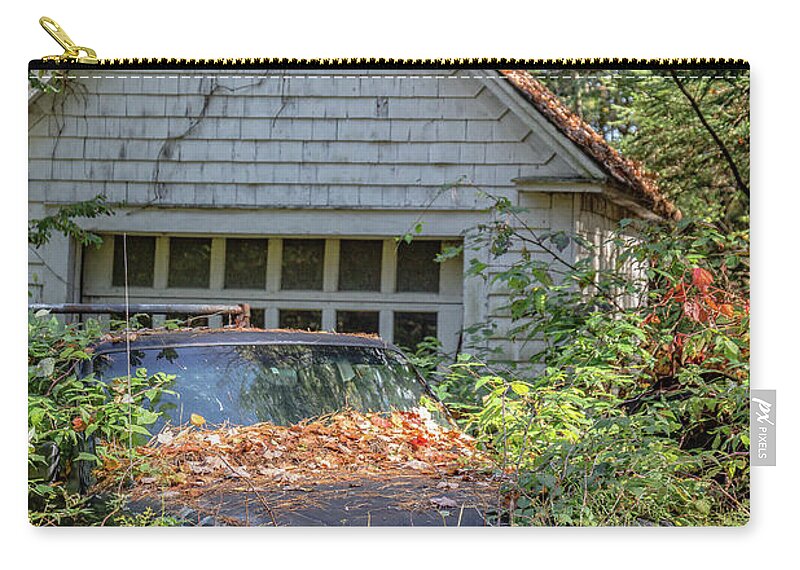 Vintage Zip Pouch featuring the photograph Old Car in the Weeds by Edward Fielding