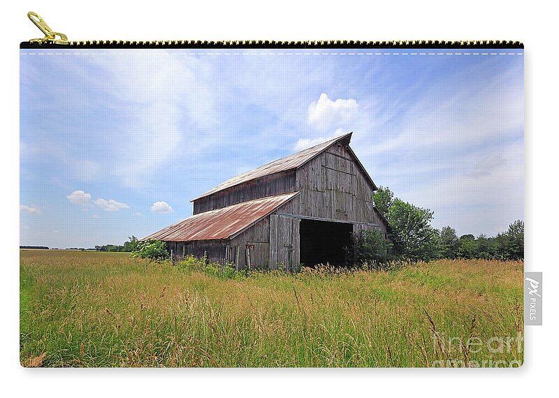 Barn Zip Pouch featuring the photograph Old Post Barn by Paula Guttilla