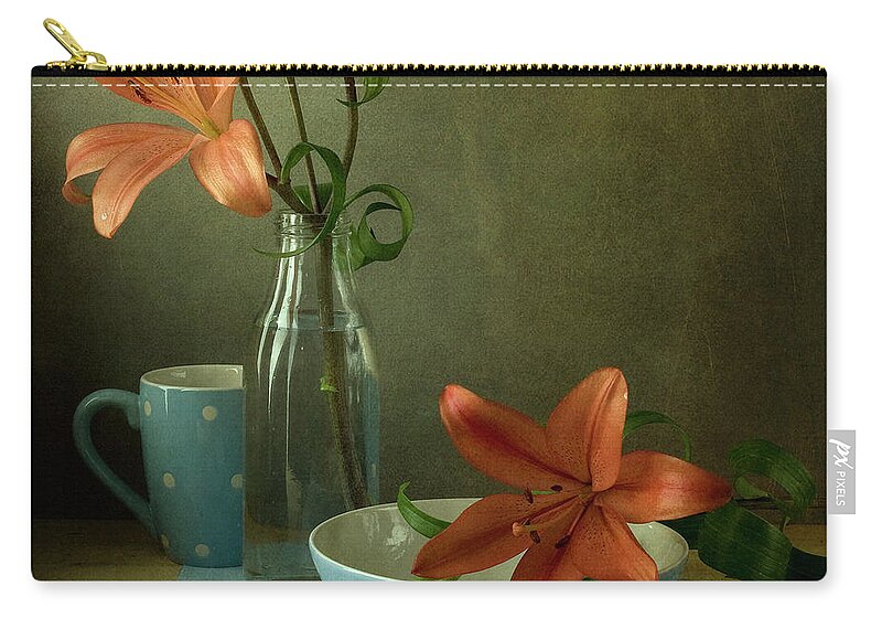 Fragility Zip Pouch featuring the photograph Orange Lily And Blue Cup With Polka Dots by Copyright Anna Nemoy(xaomena)