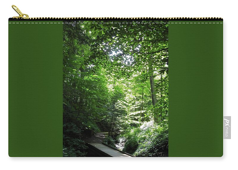 Green Zip Pouch featuring the photograph Oxygen Trail by Kathy Chism