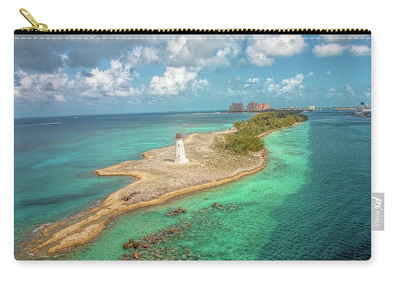 Lighthouse Zip Pouch featuring the photograph Paradise Island Lighthouse by Kristia Adams